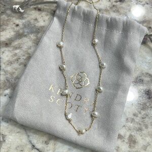 Kendra Scott Gold and White Necklace with Dainty Design